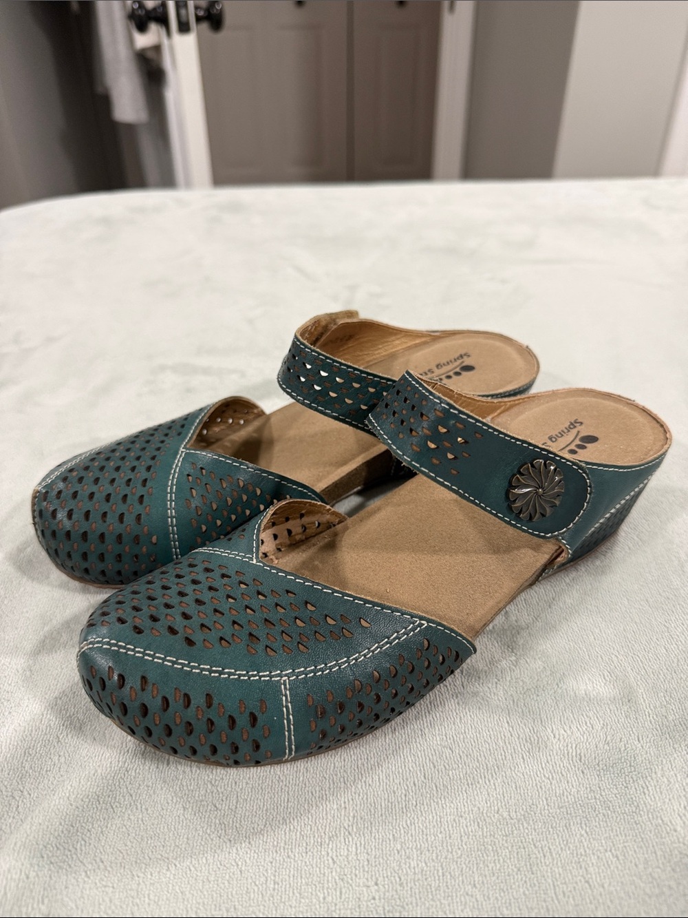 Spring Step Teal Perforated Slide Mules with Decorative Button